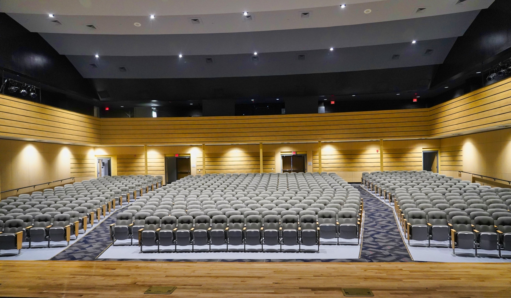 An auditorium set with rows of seats